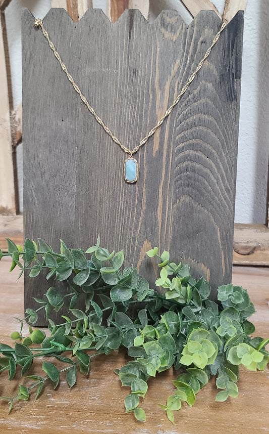 Gold twisted rope chain necklace with a rectangle amazonite drop